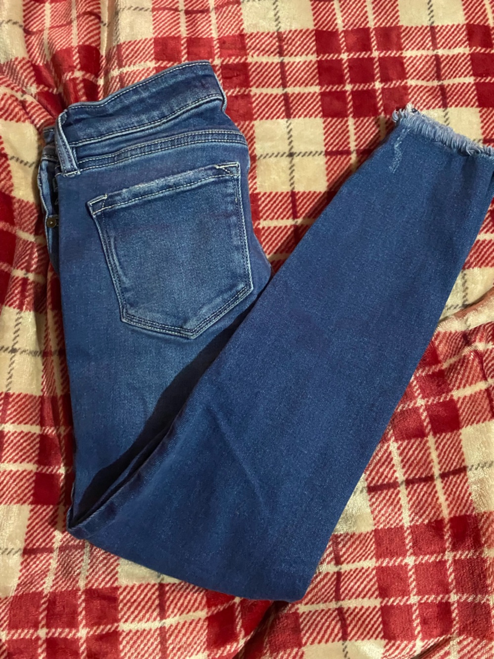 High-Rise Skinny Jeans in Dark Blue with Raw Hem